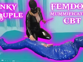 Femdom Goddess Whips Balls of Mummified Slave