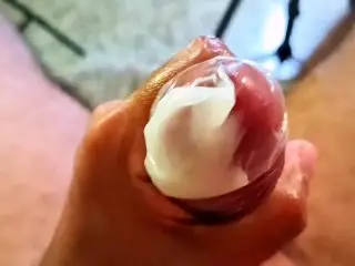 Daddy's Big Cumshot on a Condom