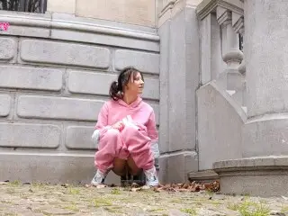 Cute Girl is Peeing Outdoor