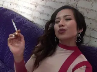 Asian Mistress Lucy Khan using her Human Ashtray