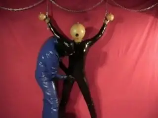 Latex Catsuit Girl with Rubber Ballhood in Bondage Gasmask Breathplay