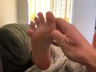 Tickling Girlfriends Tiny Feet on the Couch