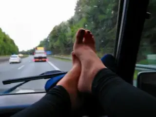 Sweaty Nylon Feet Playing on the Windshield