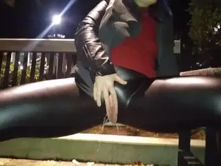 MILF in Ripped Wet look Tights,risky Piss and Mastrubates in Public Plaza