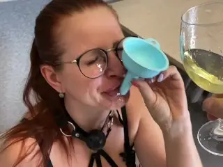 Girl is Poured into her Mouth through a Funnel with her own Piss