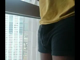 Chubby Young BBC Exhibitionist: Pissing and Cumming at Open Public Window in Hotel