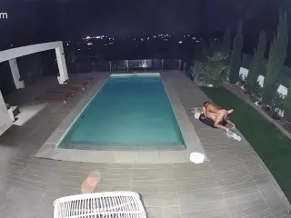 Couple Caught on Camera Fucking by the Pool