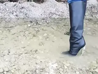 Versace metal heel leather boots in the river!