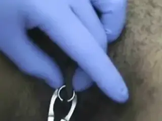 Girl getting pussy lips pierced