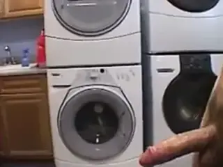 Alex jerking off guy's cock in the kitchen