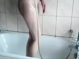Mature blonde farting in her bathtub