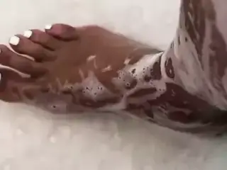 Ebony feet soles show