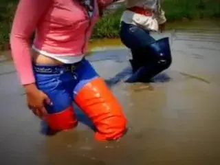 Two thai girls in muddy thigh boots!!!