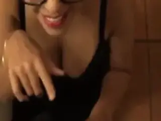 Hot busty girl in glasses gives blowjob and gets huge facial