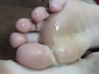 Footjob cum soles