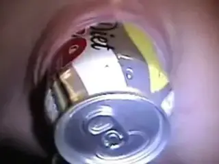 Stretched pierced pussy with coke can in it Body piercings