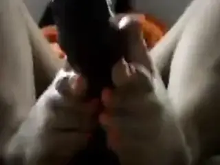 Footjob white feet on black cuck