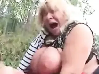Big Tit Granny Fucks in the Woods