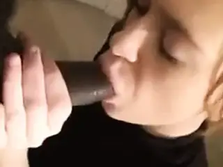 White girl sucks black cock and receive cum in mouth