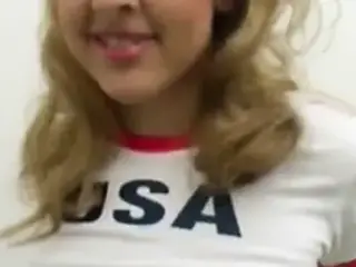 Busty blonde American soccer girl stripping