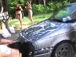 Topless college chicks erotically wash car at the picnic