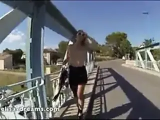 Flashing my huge tits in public on a bridge