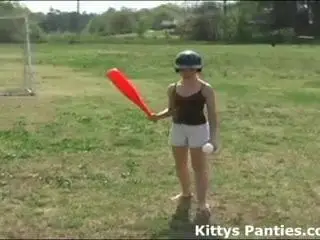 Innocent teen Kitty playing softball outdoors