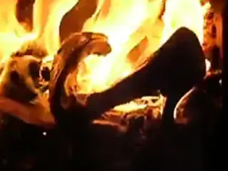 Sexy leather heeled shoes on fire.
