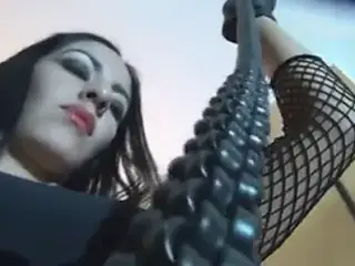 stunning mistress whipping slave