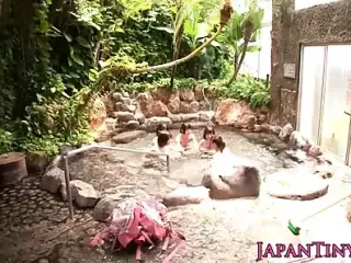 Group of tiny Japanese babes sharing cock in onsen
