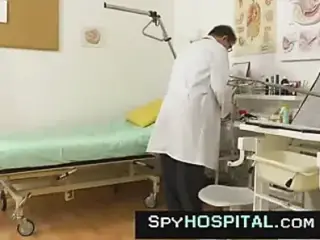 Real pelvic exam of petite female hidden cam footage