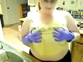Chubby Girl Dish Washing in Rubber Gloves 1
