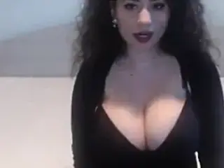 curly hair and big tits on webcam