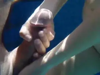 Wife pulling my cock underwater