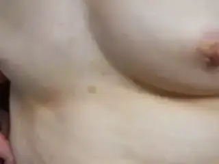 wife's small tits and spread hairy pussy and swollen clit