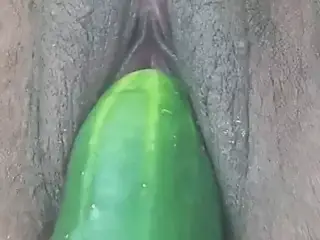 a large cucumber and a cigarette in my pussy