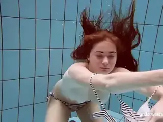 Watch the sexiest girls swim naked in the pool