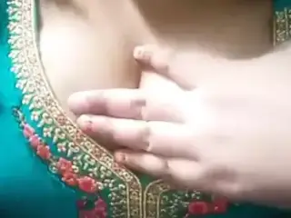 Big boobs desi aunty in dress shows cleavage