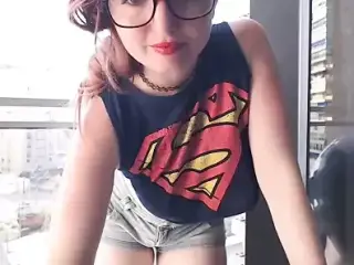 Supergirl Clothed flashing boobs in balcony