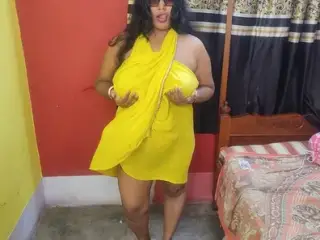 Sexy Bengali Bhabi fucking with Cucumber in her bedroom in yellow dress