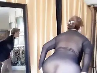 Dancing naked in a transparent dress. Mature 67 year  woman