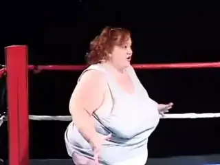 Fat midget girl is shoving a dildo in lesbian midget's pussy