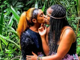 African festival outdoor lesbian make-out