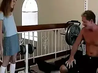 Skinny Barely Legal Slut Sucks a Hard Cock on a Weight Bench Then Gets Drilled