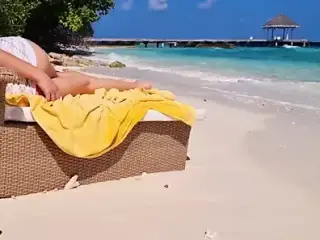 Girl relaxing on a beach – Hot ass – no panties