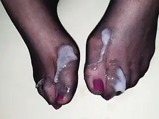 Big cumshot on Wife's nylon feet