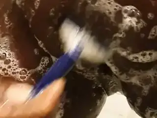 My gf shaving her hairy pussy