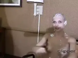 Blonde girl gets head shaved