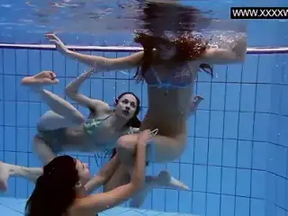 Three hot bitches naked in the pool