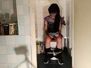 Sexy goth teen pees while playing with her phone pt1 HD